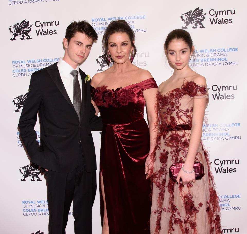 Dylan Michael Douglas, Catherine Zeta-Jones and Carys Zeta Douglas at a public appearance for The Royal Welsh College Presents Catherine Zeta-Jones with Honorary Degree, Rainbow Room, New York, NY March 1, 2019. Photo By: RCF/Everett Collection