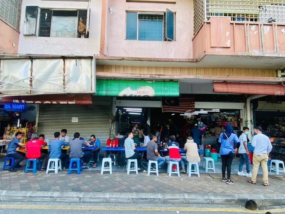 Mansion Tea Stall - Customers sitting outside the shop