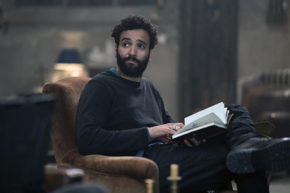 This image released by Netflix shows Marwan Kenzari in a scene from "The Old Guard." (Aimee Spinks/Netflix via AP)