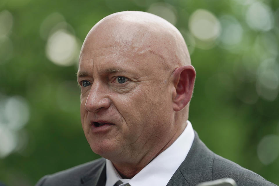 FILE - Sen. Mark Kelly, D-Ariz., speaks outside the Capitol in Washington on Aug. 2, 2022. The consequences of drought and efforts to funnel billions of dollars toward securing water supplies in the West are becoming larger issues in two of the most consequential races for the U.S. Senate. Two vulnerable incumbents whose states are hit hardest by the cuts — Catherine Cortez Masto of Nevada and Mark Kelly of Arizona — seized on the opportunity to seek funding through the federal legislation. (AP Photo/Mariam Zuhaib, File)