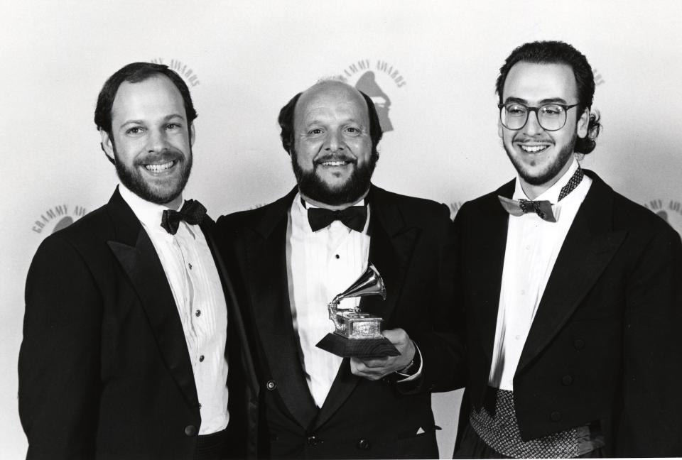 Dan Einstein (right) celebrates a Grammy win with Hank Neuberger and Al Bunetta