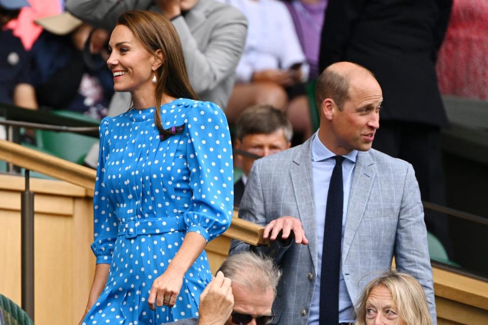 Britain's Catherine, Duchess of Cambridge (L) and Britain's Prince William, Duke of Cambridge, arrive at the Royal Box at the Centre court prior to the start of the men's singles quarter final tennis match between Serbia's Novak Djokovic and Italy's Jannik Sinner on the ninth day of the 2022 Wimbledon Championships at The All England Tennis Club in Wimbledon, southwest London, on July 5, 2022. - RESTRICTED TO EDITORIAL USE (Photo by SEBASTIEN BOZON / AFP) / RESTRICTED TO EDITORIAL USE (Photo by SEBASTIEN BOZON/AFP via Getty Images)