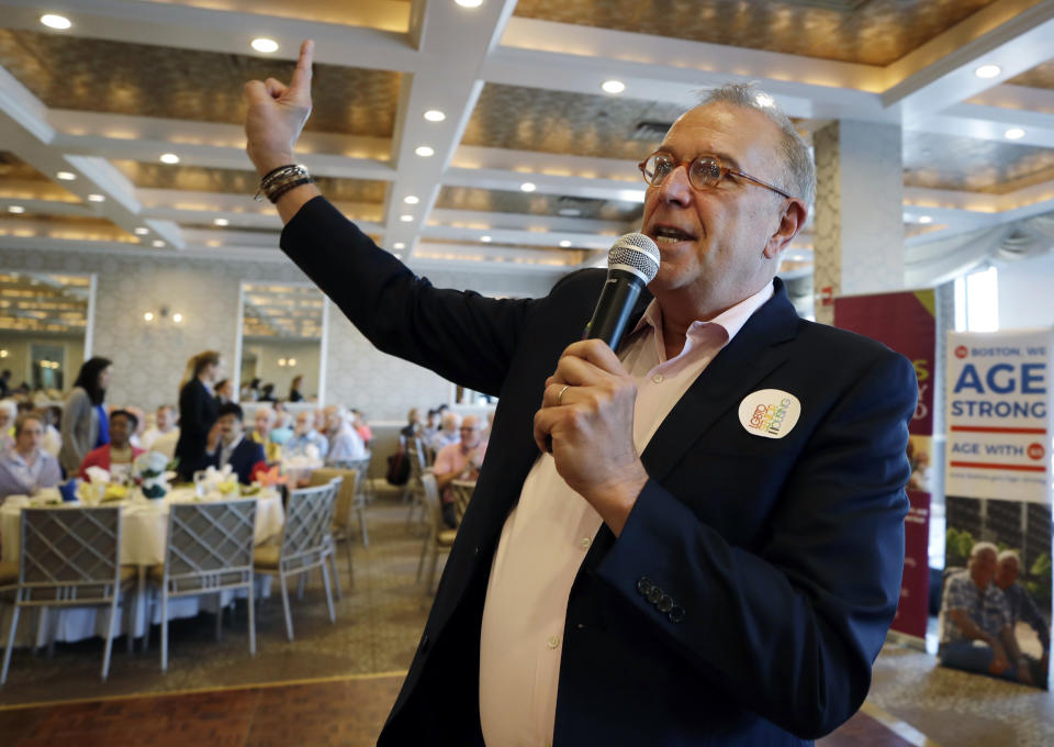 In this June 7, 2019, photo, Boston Pride Parade grand marshal Dale Mitchell speaks at a Pride event in Boston. Mitchell was at The Stonewall Inn when riots broke out between gays and police 50 years earlier in New York's Greenwich Village. (AP Photo/Elise Amendola)