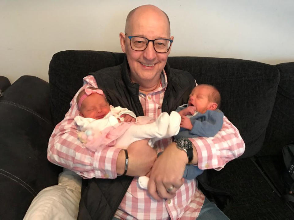 Michael Harris with twins Betty Vera Hemson and Bertie Harris Hemson. (SWNS)