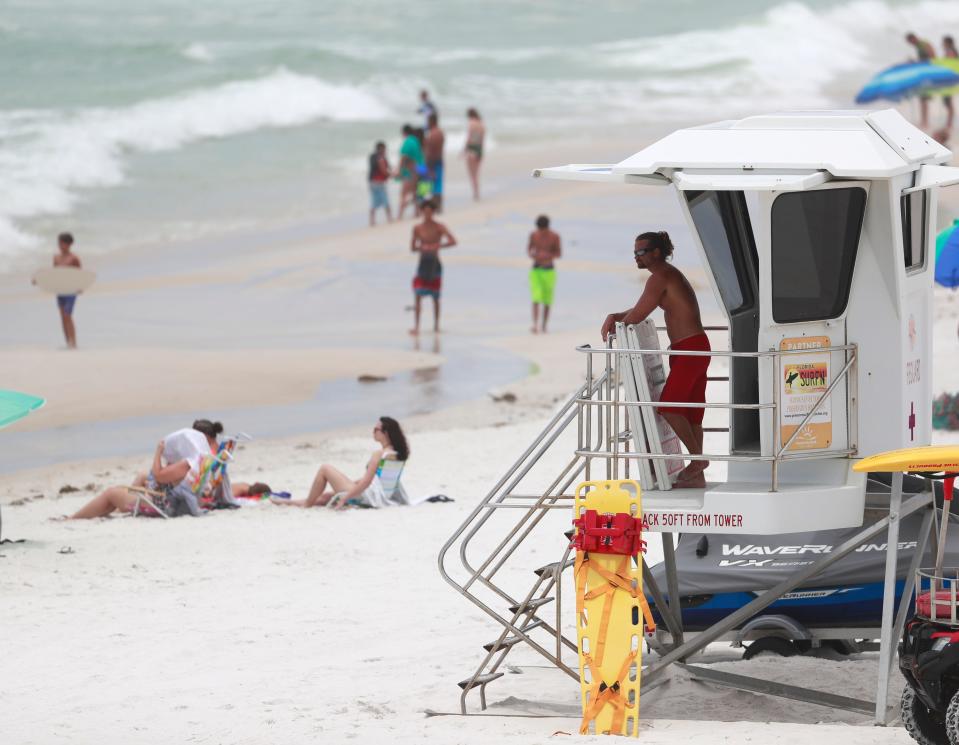 A lifeguard looks out over the Gulf of Mexico during a double-red flags day in July 2020.