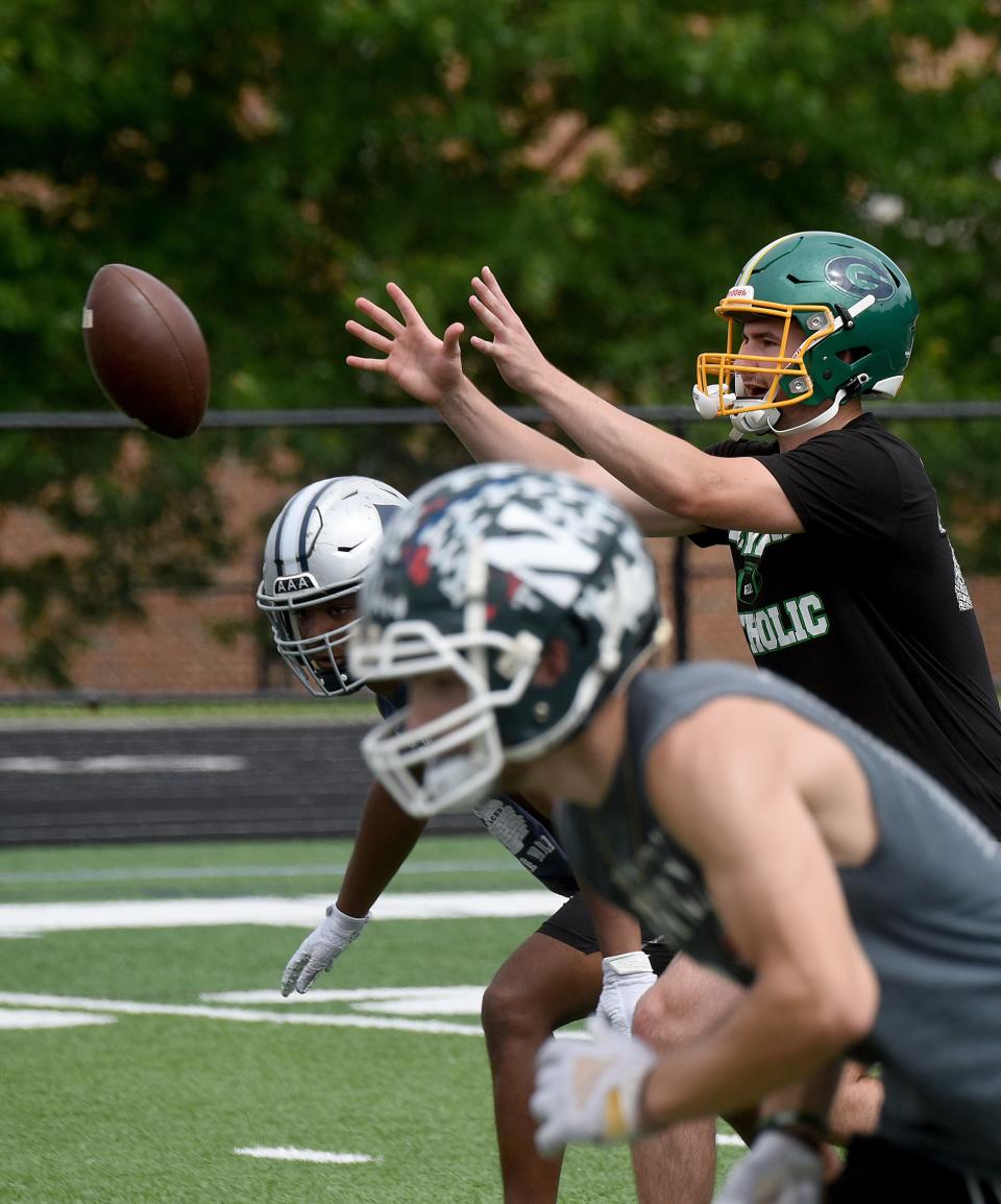 Quarterback Cole Canter takes the snap during a practice for the Licking County all-star football team on Wednesday, June 8, 2022 at Granville High School. Licking County will take on Muskingum Valley on Friday, June 17.