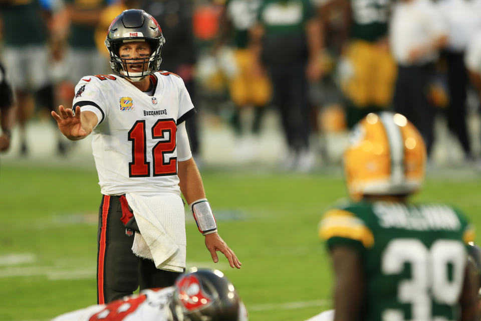 TAMPA, FLORIDA - OCTOBER 18: Tom Brady #12 of the Tampa Bay Buccaneers calls a play against the Green Bay Packers during the third quarter at Raymond James Stadium on October 18, 2020 in Tampa, Florida. (Photo by Mike Ehrmann/Getty Images)