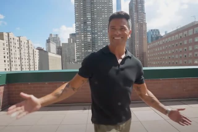 <p>Youtube</p> Mark Consuelos admiring the view from his former NYC apartment.
