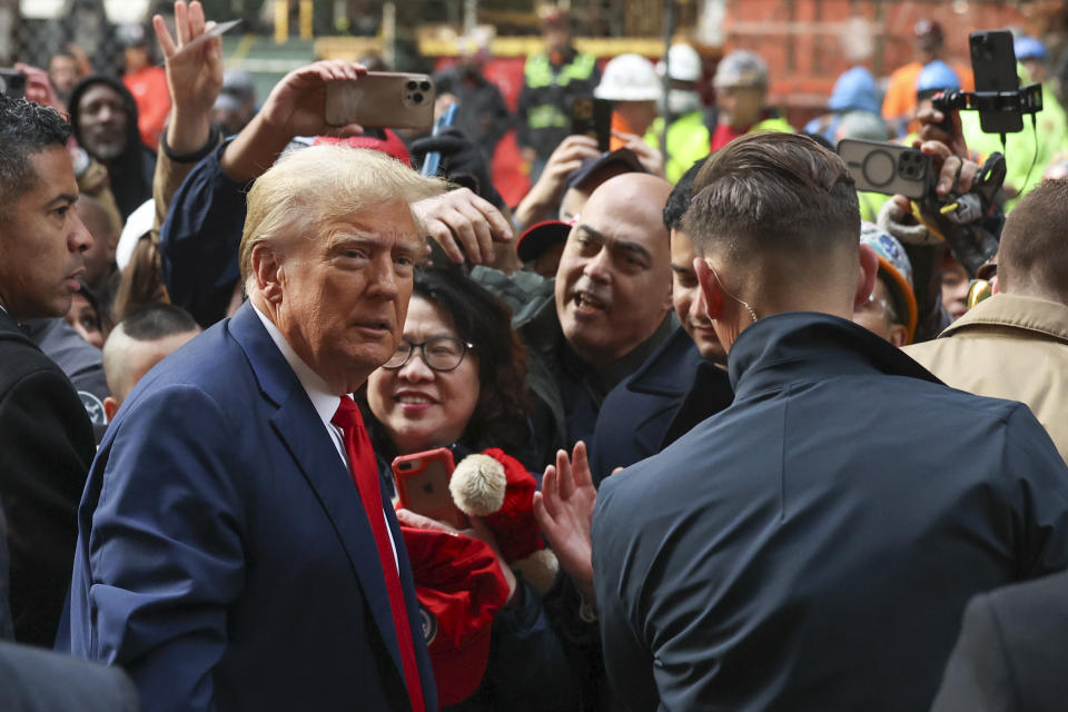 Former President Donald Trump speaks with union representatives at the construction site of the new JPMorgan Chase headquarters in midtown Manhattan, Thursday, April 25, 2024, in New York. Trump met with construction workers and union representatives hours before he's set to appear in court. (AP Photo/Yuki Iwamura)