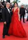 <p>The model was a red carpet sensation in a plunging crimson gown by Zuhair Murad.<br><i>[Photo: Getty]</i> </p>