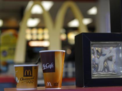 McDonald's sign and coffee cups: Credit Reuters