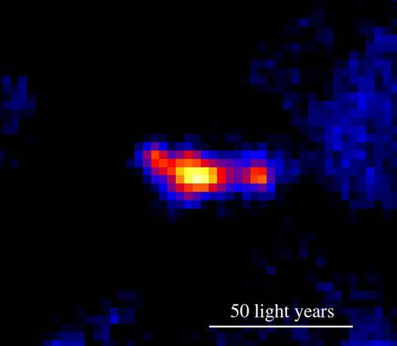 This view of the microquasar MQ1, a black hole in the galaxy M83, shows the strange object as it appeared to the Hubble Space Telescope's Wide Field Camera 3. Two lobes of hot gas, created by the pair of jets, are clearly visible on either side