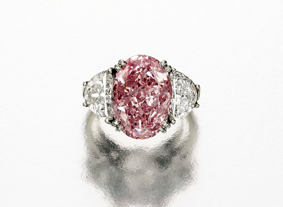 This undated photo provided by Sotheby's shows a rare Fancy Intense Pink diamond ring weighing 6.54 carats, that has a pre-sale estimate of $4 million to $5 million. It is among a trove of jewels from the collections of Estee and Evelyn Lauder that will be auctioned to benefit breast cancer research on Dec. 5. (AP Photo/Sotheby's)