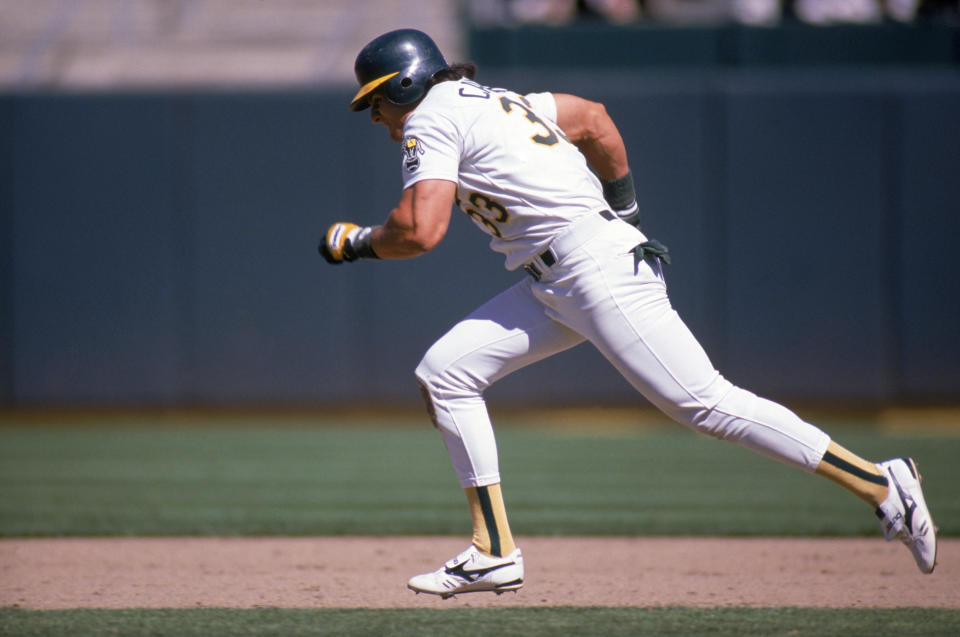 Canseco runs the bases during a game in 1988. (Otto Greule Jr/Getty Images)