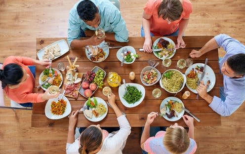 <span class="caption">Proponents of the diet claim slowly increasing calorie intake can boost your metabolism.</span> <span class="attribution"><a class="link " href="https://www.shutterstock.com/image-photo/eating-leisure-concept-group-people-having-795968329" rel="nofollow noopener" target="_blank" data-ylk="slk:Syda Productions/ Shutterstock;elm:context_link;itc:0;sec:content-canvas">Syda Productions/ Shutterstock</a></span>