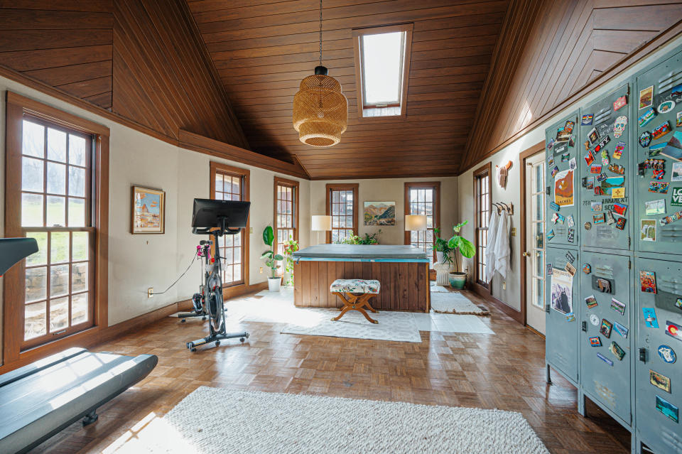 A large room in a newly listed Delaware County home is used as a spa and workout room.