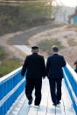 <p>North Korean leader Kim Jong-Un (L) talks with South Korean President Moon Jae-In (R) at the Joint Security Area (JSA) on the Demilitarized Zone (DMZ) in the border village of Panmunjom in Paju, South Korea, April 27, 2018. (Photo: Korea Summit Press Pool/EPA-EFE/REX/Shutterstock) </p>