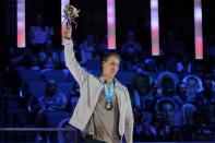 Chase Kalisz waves at the award ceremony after winning the Men's 400 Individual Medley at the U.S. Olympic Swim Trials on Sunday, June 13, 2021, in Omaha, Neb. (AP Photo/Charlie Neibergall)