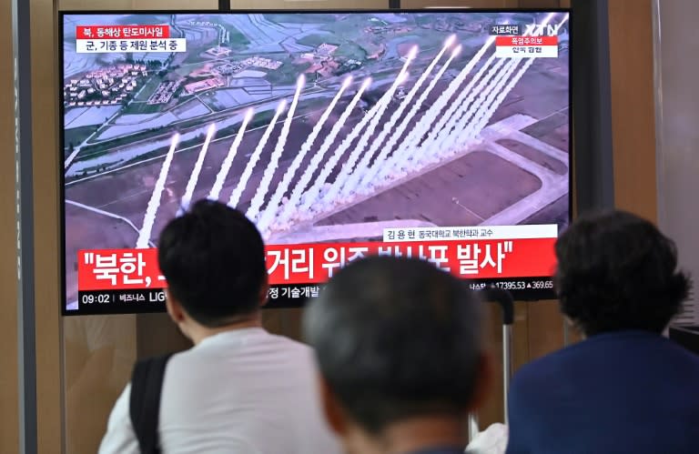 File footage of a North Korean missile test was broadcast at a train station in Seoul after South Korea's northern neighbour fired multiple ballistic missiles (Jung Yeon-je)