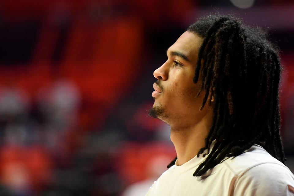 Illinois' Skyy Clark warms up for an NCAA college basketball game against Alabama A&M, Saturday, Dec. 17, 2022, in Champaign, Ill.