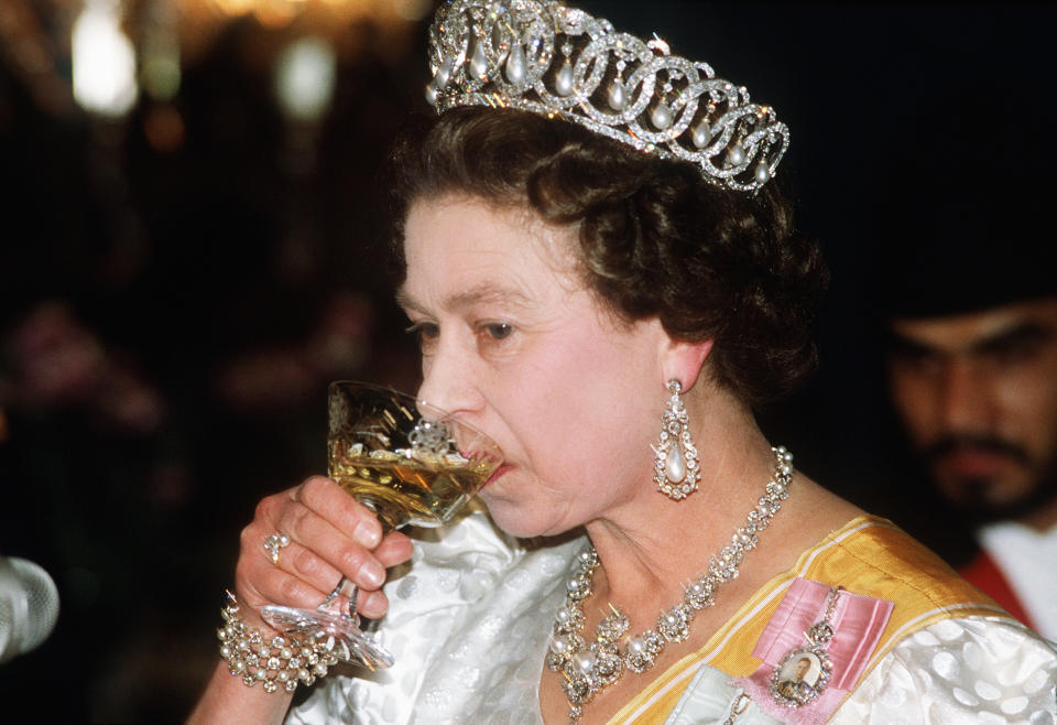 NPL: Queen Elizabeth II attends a state banquet in Nepal (Anwar Hussein / Getty Images)