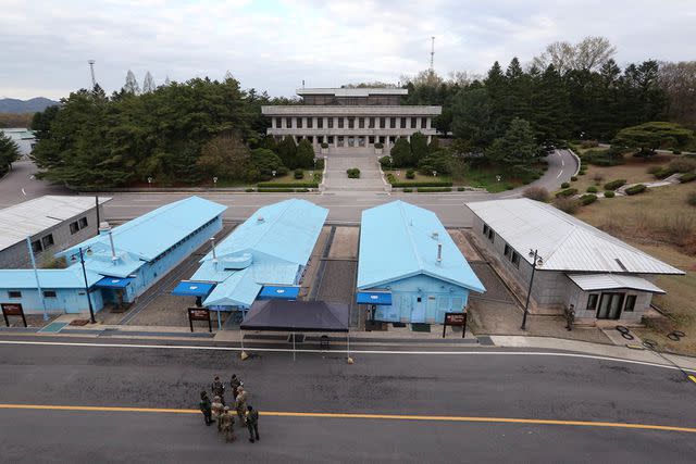 <p>AP Photo/Ahn Young-joon</p> South Korean and U.S. Army soldiers stand in the border village of Panmunjom in the demilitarized zone between the two Koreas.