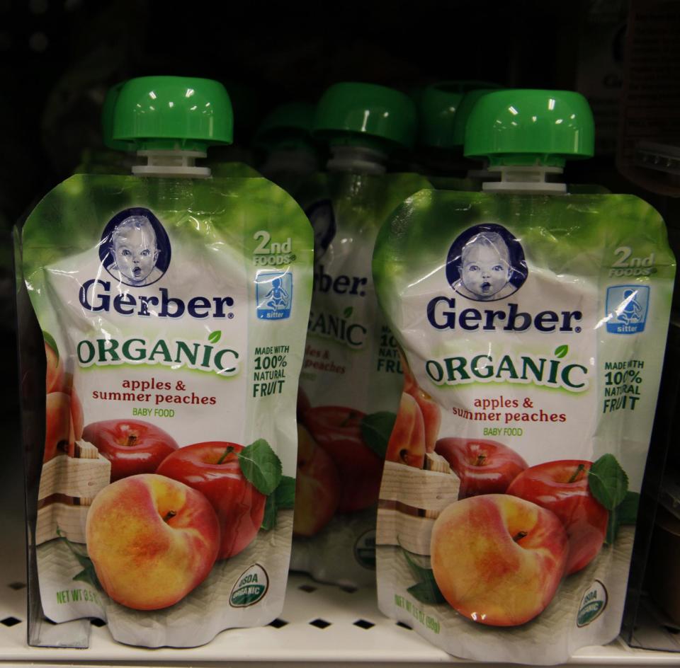 Gerber organic baby food pouches are seen on the shelf in the baby food aisle in City Target on Thursday, Jan. 3, 2013, in downtown Los Angeles. Organic baby food often is packaged in pouches, an industry innovation popular in its own right. Though they can be more expensive, pouches are beloved by parents who can let their kids feed themselves at a young age. (AP Photo/Nick Ut)