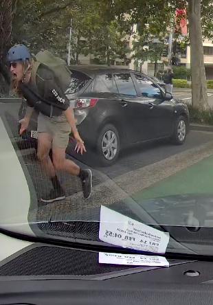 The man leapt to his feet to confront the person responsible. Source: Facebook/Dash Cam Owners Australia