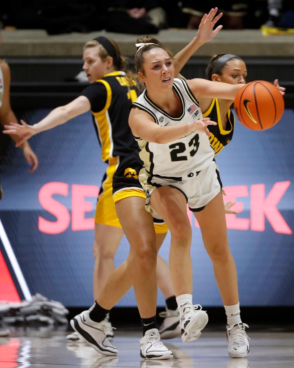 Purdue Boilermakers guard Abbey Ellis (23) passes the ball during of the NCAA women’s basketball game against the Iowa Hawkeyes, Wednesday, Jan. 10, 2024, at Mackey Arena in West Lafayette, Ind.