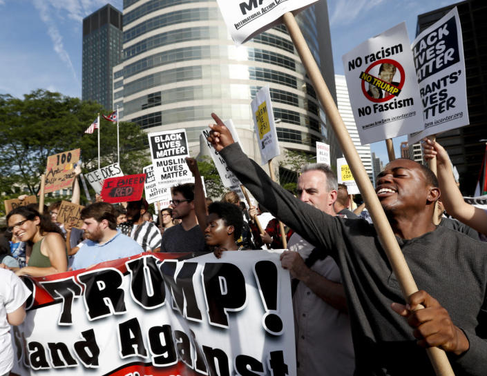 <p>Demonstrators yell during the Shut Down Trump and the RNC protest on Sunday, July 17, 2016, in Cleveland, Ohio. (Photo: Alex Brandon/AP)</p>