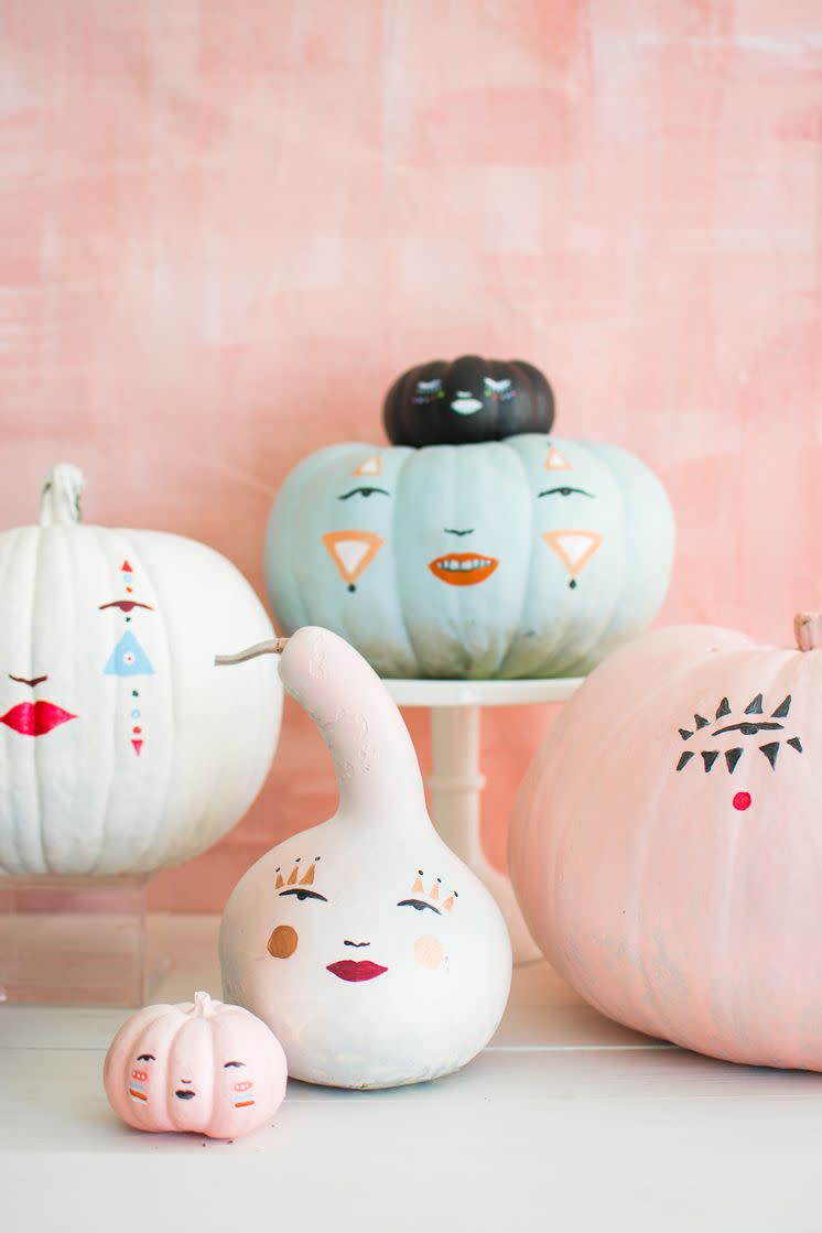 <p>Some pastel pumpkins could add a cool contrast to your spookier Halloween decor. These are like mini art pieces — and they don't require you to pick up a knife. </p><p><em><a href="https://thehousethatlarsbuilt.com/2017/10/pastel-pumpkin-faces.html/" rel="nofollow noopener" target="_blank" data-ylk="slk:Get the tutorial at The House That Lars Built »;elm:context_link;itc:0;sec:content-canvas" class="link ">Get the tutorial at The House That Lars Built »</a></em></p><p><strong>RELATED:</strong> <a href="https://www.goodhousekeeping.com/holidays/halloween-ideas/g1566/easy-halloween-craft-ideas/" rel="nofollow noopener" target="_blank" data-ylk="slk:56 Easy Crafts for Adults Who Love Halloween;elm:context_link;itc:0;sec:content-canvas" class="link ">56 Easy Crafts for Adults Who Love Halloween</a></p>