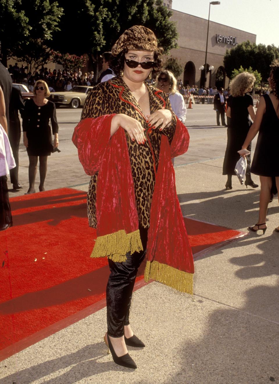 Rosie O'Donnell dressed in cheetah print and red blanket