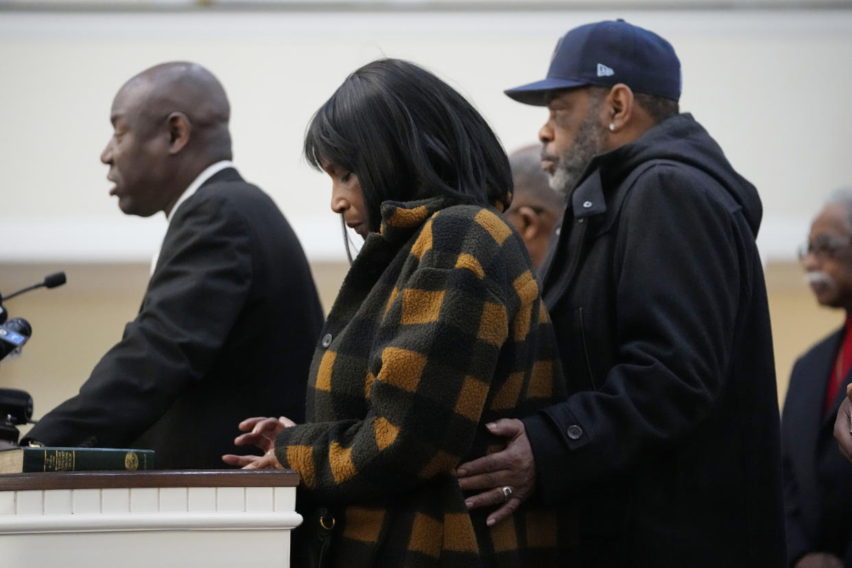 Civil rights attorney Attorney Ben Crump speaks at a news conference with RowVaughn Wells, mother of Tyre Nichols, who died after being beaten by Memphis police officers, and his stepfather Rodney Wells, right, in Memphis, Tenn., Friday, Jan. 27, 2023. (AP Photo/Gerald Herbert)