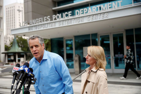 James Otis, the man who admits vandalizing Donald Trump's star on the Hollywood Walk of Fame, speaks to the media with his attorney Mieke ter Poorten about his arrest outside of the LAPD Metropolitan Detention Center in Los Angeles, California October 27, 2016. REUTERS/Patrick T. Fallon