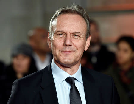 Anthony Head poses as he arrives for the world premiere of "A Street Cat Named Bob" at The Curzon Mayfair in London, Britain November 3, 2016. REUTERS/Dylan Martinez