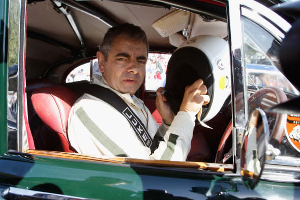 Rowan Atkinson crashes car at Goodwood race
