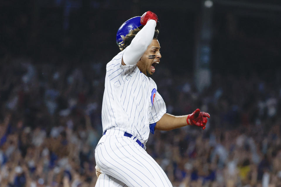 Aug 16, 2023; Chicago, Illinois, USA; Chicago Cubs second baseman Christopher Morel (5) celebrates as he rounds the bases after hitting a three-run walk-off home run against the Chicago White Sox during the ninth inning at Wrigley Field. Mandatory Credit: Kamil Krzaczynski-USA TODAY Sports