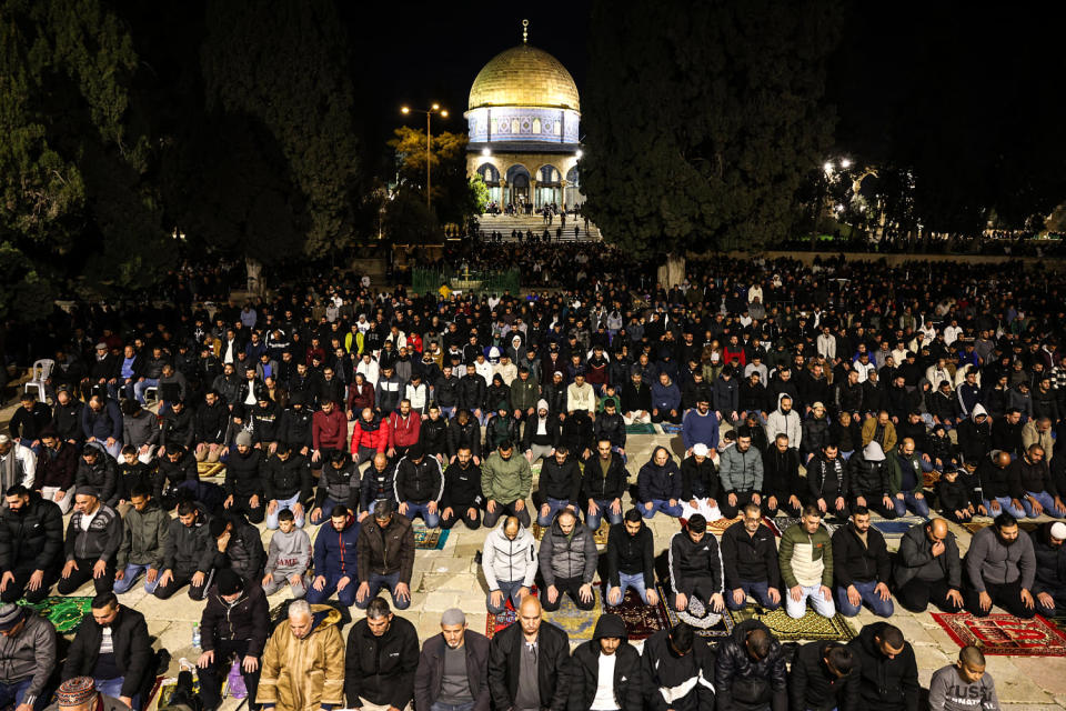 Image: Palestinian worshippers pray in front of the Dome of the Mosque at the al-Aqsa mosque (Ahmad Gharabli / AFP - Getty Images)