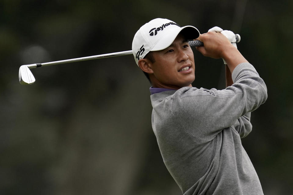 Collin Morikawa watches his tee shot on the third hole during the final round of the PGA Championship golf tournament at TPC Harding Park Sunday, Aug. 9, 2020, in San Francisco. (AP Photo/Jeff Chiu)