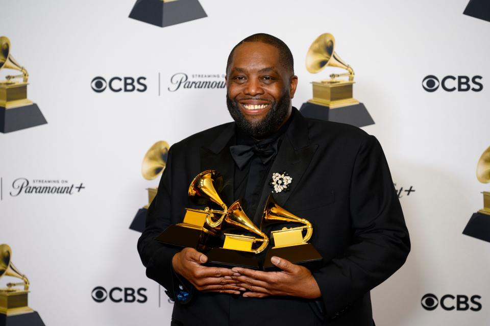 Killer Mike shows off his three Grammys for best rap song and rap performance (for "Scientists and Engineers") and best rap album (for "Michael").