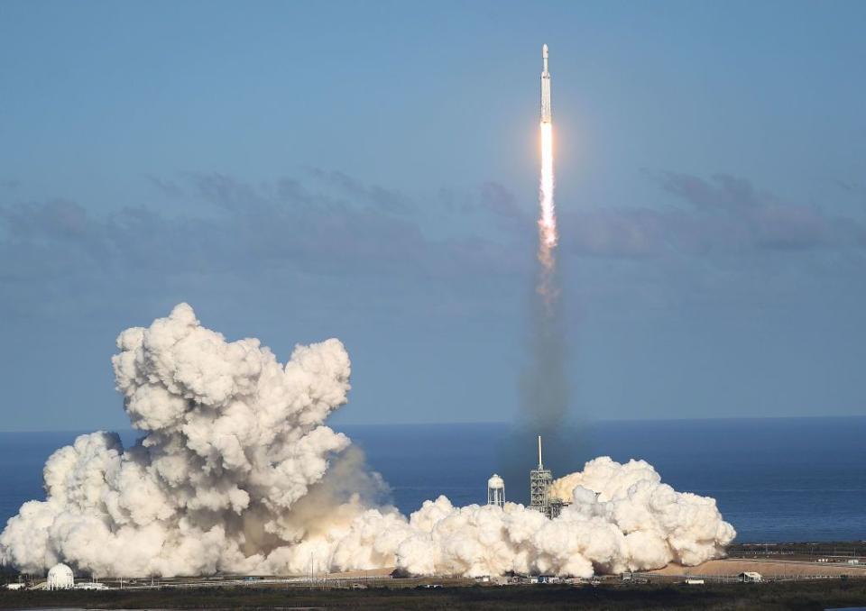 The SpaceX Falcon Heavy rocket lifts off from launch pad 39A at Kennedy Space Center on February 6, 2018 in Cape Canaveral, Florida. The rocket is the most powerful rocket in the world and is carrying a Tesla Roadster into orbit.