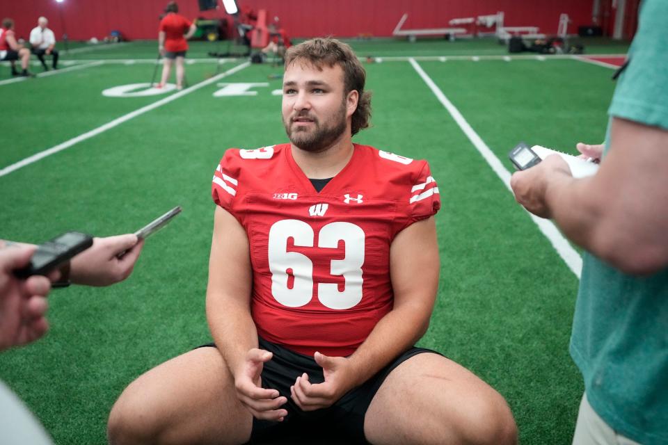 Wisconsin Badgers offensive lineman Tanor Bortolini (63) answers questions during Wisconsin Badgers football media day at Camp Randall Stadium in Madison on Tuesday, Aug. 1, 2023.  -  Mike De Sisti / The Milwaukee Journal Sentinel