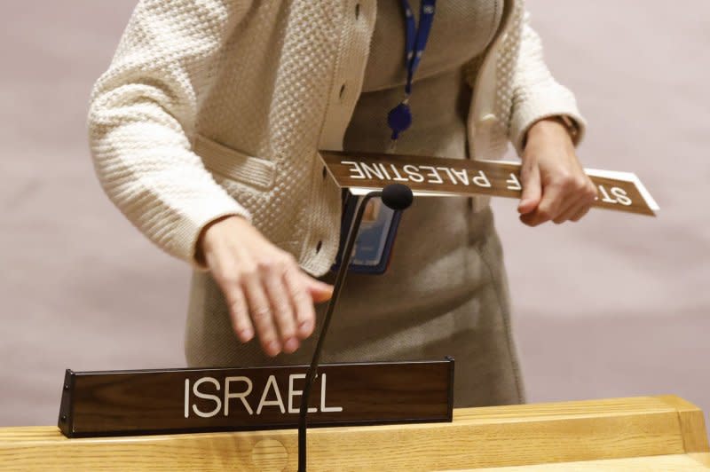 Country name plates for Israel and State Of Palestine are placed in position before a Security Council meeting on the situation in the Middle East, including the Palestinian question, in the Security Council Chamber at United Nations Headquarters on Wednesday in New York City. The Security Council met again on Wednesday in response to the worsening Israel-Palestine crisis. Photo by John Angelillo/UPI