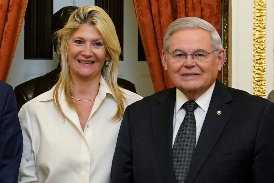 PHOTO: Senate Foreign Relations Committee Chairman, Sen. Bob Menendez, D-N.J., right, and his wife Nadine Arslanian, pose for a photo on Capitol Hill in Washington, Tuesday, Dec. 20, 2022. (Susan Walsh/AP, FILE)