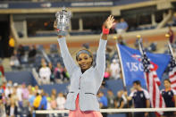 Serena Williams, USA, with her trophy after winning the Women's Singles Final at the US Open, Flushing. New York, USA. 8th September 2013. (Photo by Tim Clayton/Corbis via Getty Images)
