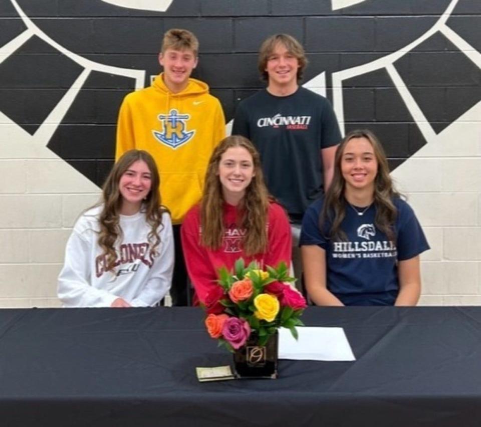 Lakota East High School celebrates November 2022 National Signing Day by honoring, from left, front, Erica Cox, Eastern Kentucky University soccer; Madison French, Miami University (Oxford) basketball; Savannah Smith, Hillsdale College basketball; back, Jack Kronauge, Rollins College basketball, and Carson French, baseball, University of Cincinnati.