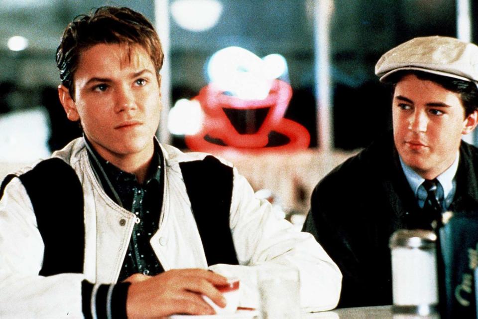 <p>Cinematic/Alamy</p> River Phoenix and Matthew Perry in "A Night in the Life of Jimmy Reardon" (1988)