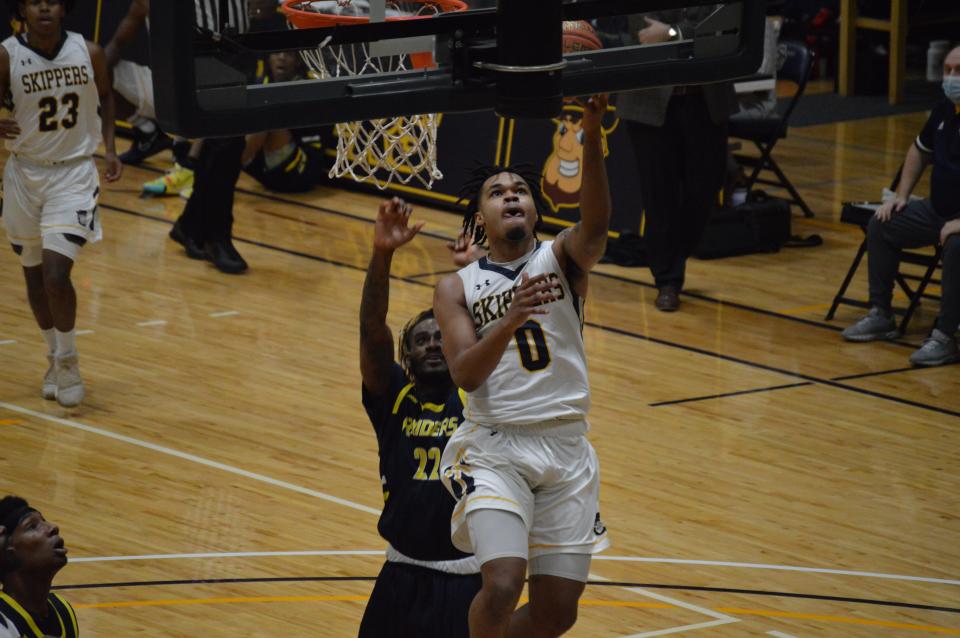 SC4 men's basketball's Caron Clayton attempts a layup during a game earlier this season. The guard finished with 21 points, four rebounds and four steals in the Skippers' 76-74 win over No. 12 Henry Ford on Saturday.