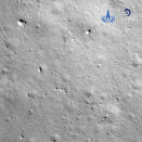This image taken by camera aboard Chang'e-5 spacecraft provided by China National Space Administration shows a moon surface during its landing process Tuesday, Dec. 1, 2020. The Chinese spacecraft landed on the moon Tuesday to bring back lunar rocks to Earth for the first time since the 1970s, the government announced. (China National Space Administration via AP)