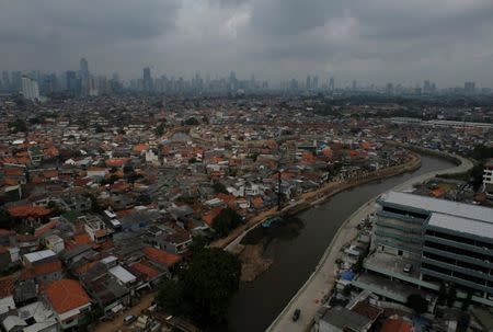 Aerial view of Ciliwung River as seen from Jatinegara district in Jakarta, Indonesia, December 29, 2016. Picture taken December 29, 2016. REUTERS/Beawiharta